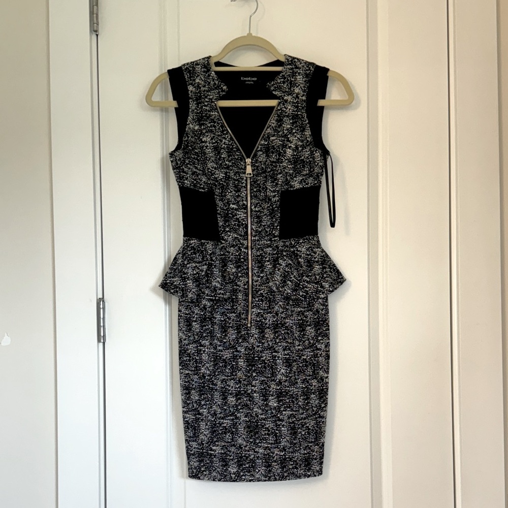 Form-fitted, front zip, peplum tweed dress from BeBe